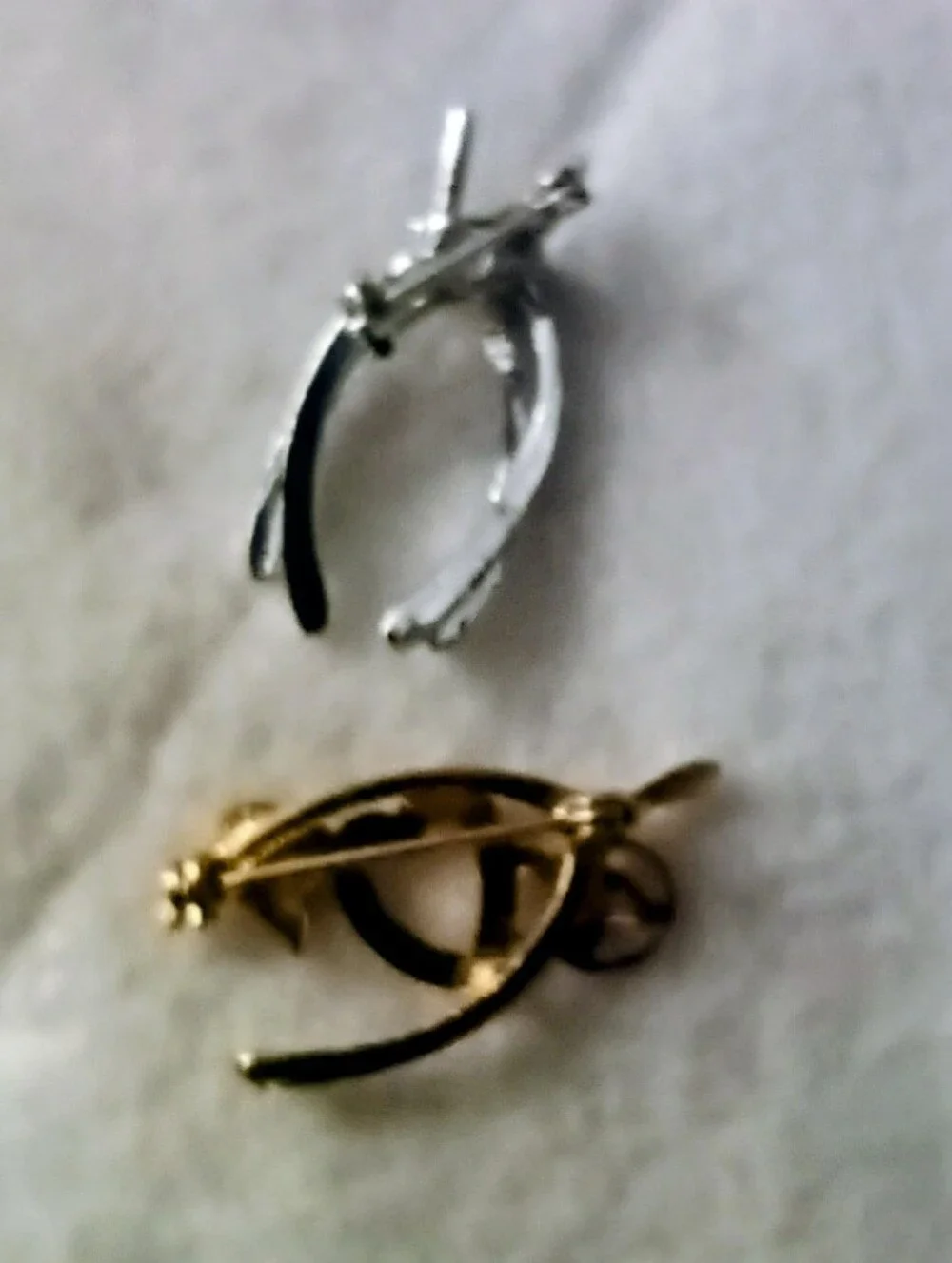 2 Wishbone Brooches